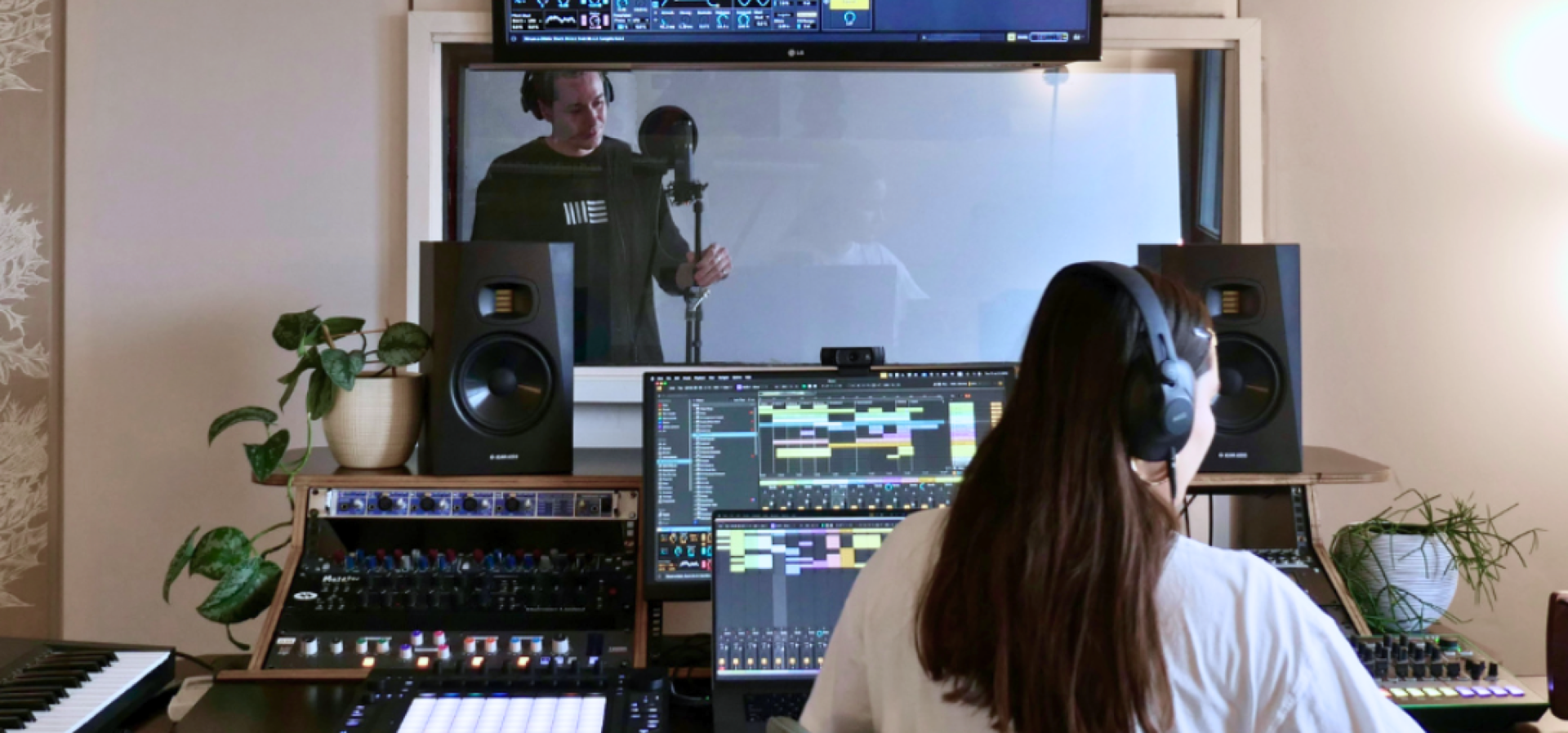 student and mentor recording and producing vocals with Ableton