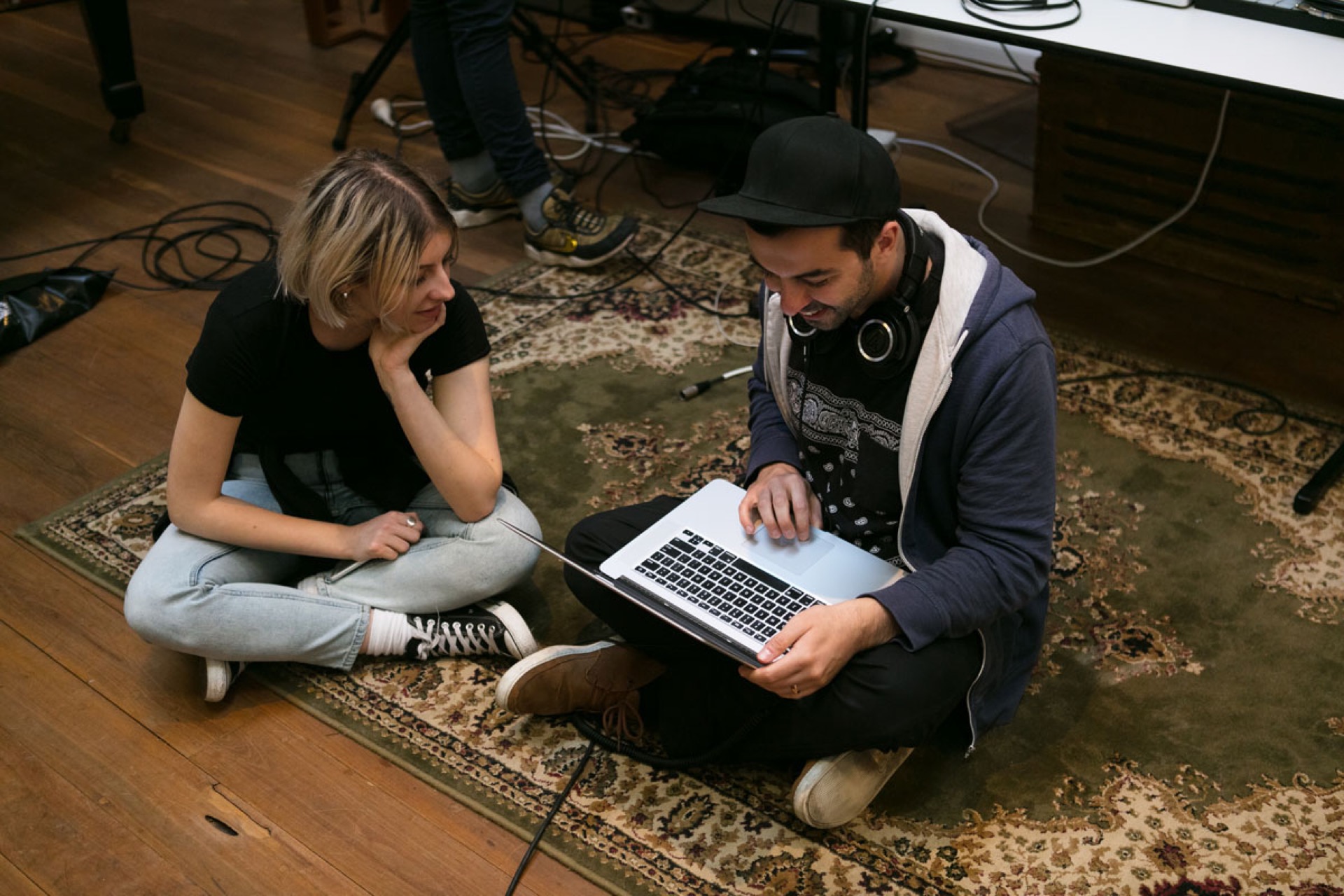 music production students sharing ideas