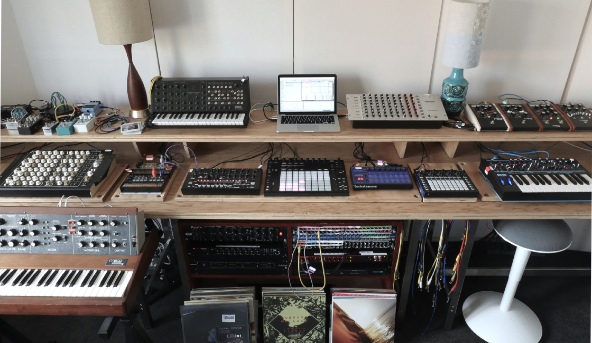 Collection of vintage and modern synthesisers, drum machines and effects pedals