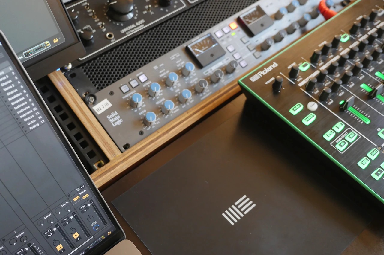 Studio hardware audio equipment with drum machine, Ableton Live and Ableton mousepad