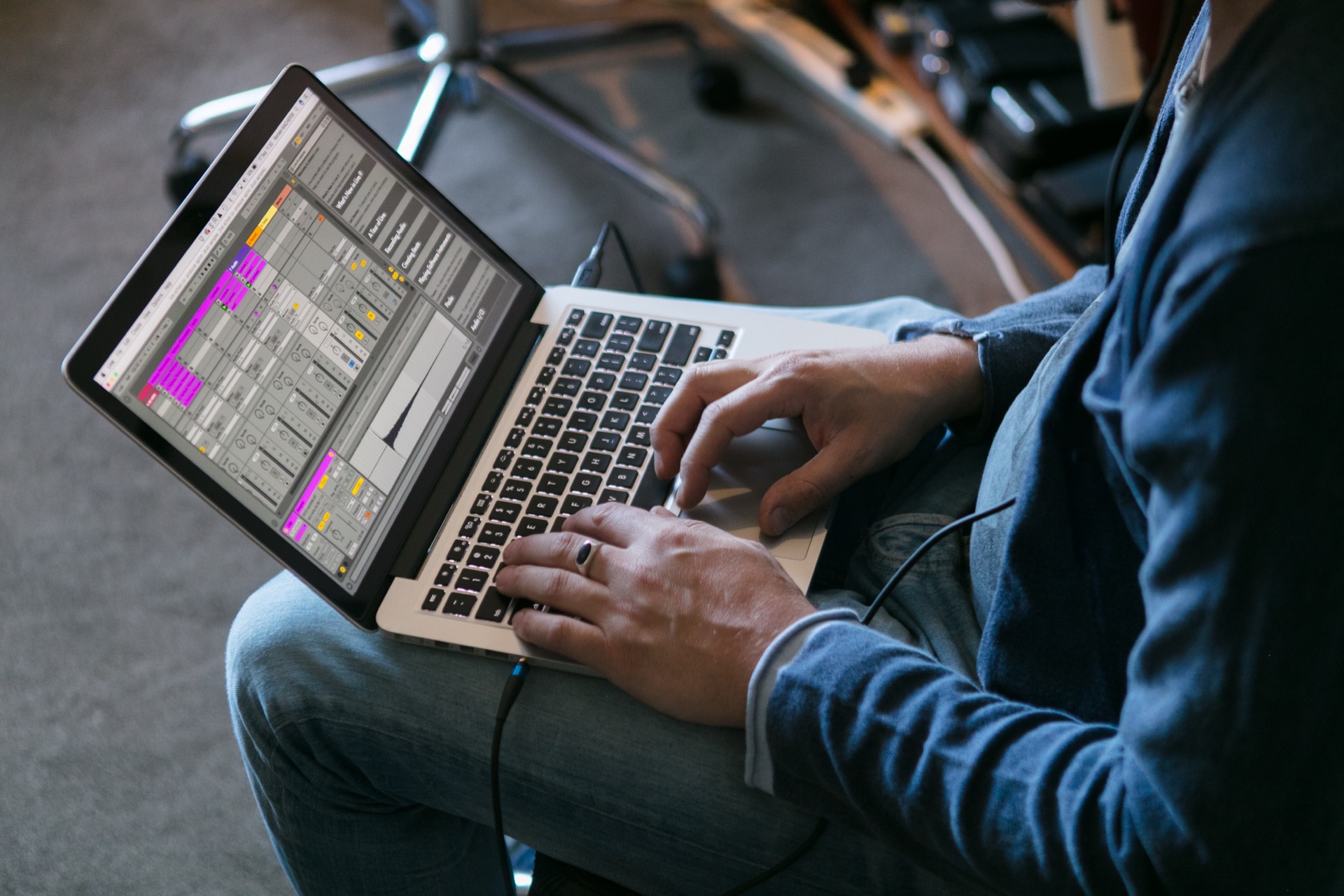 student making music on a laptop with ableton live