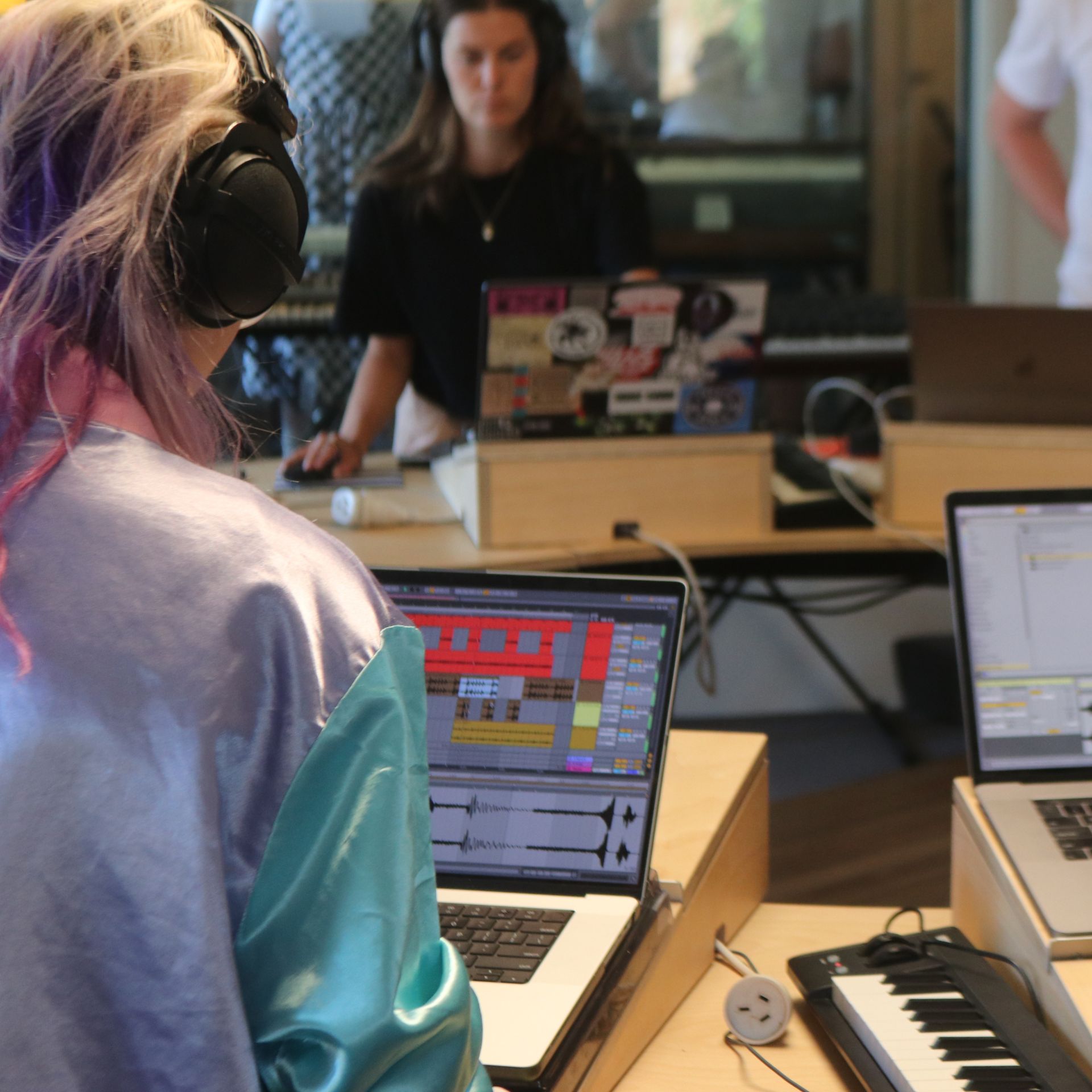 class group making music at Liveschool Sydney during an Ableton production lesson.
